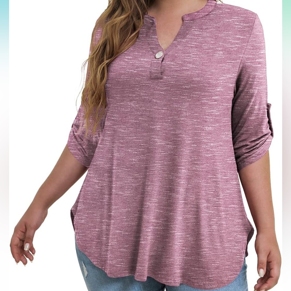 Three quarter sleeve top with button.
